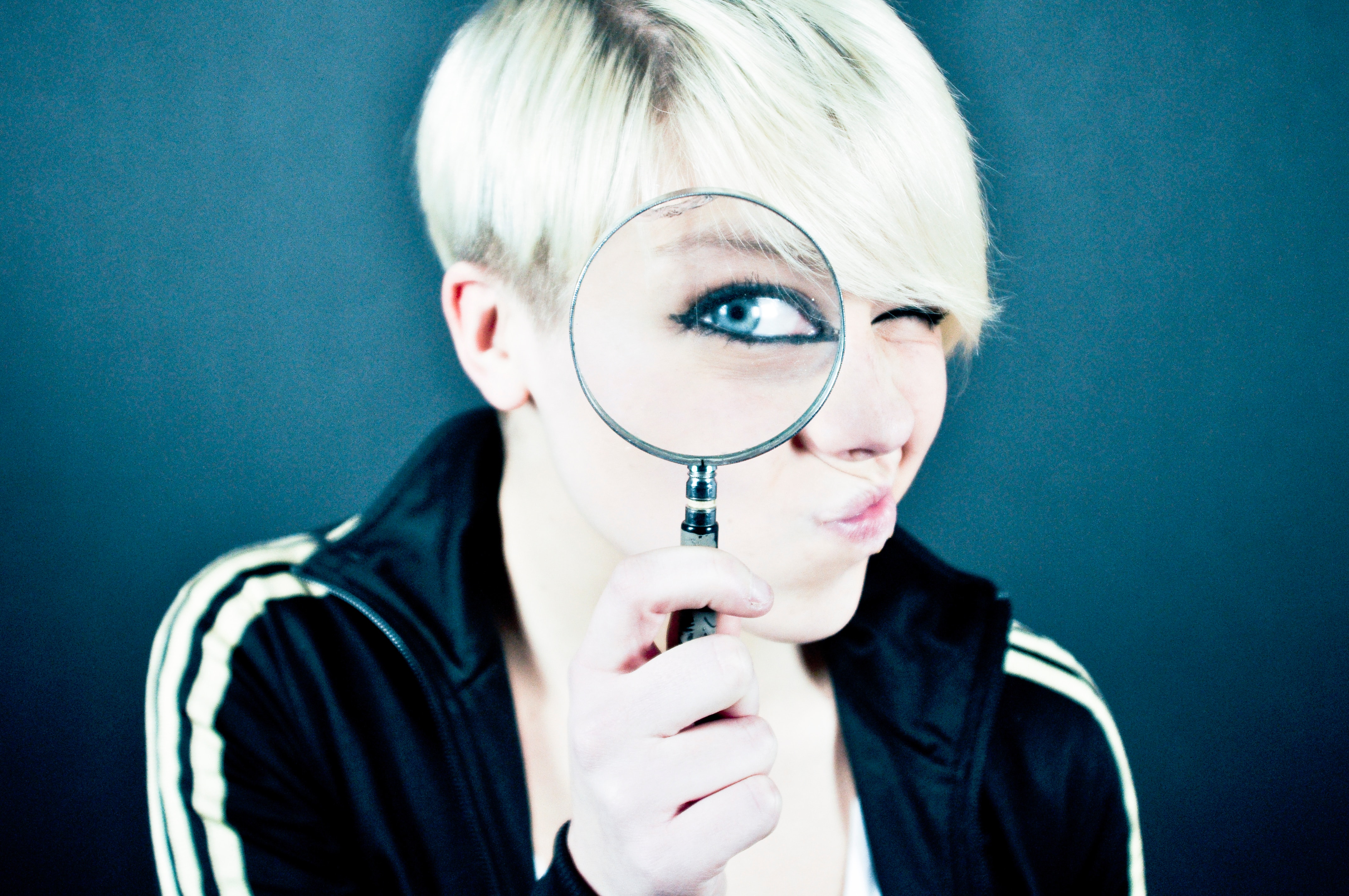 Magnifying Glass lady - Photo by Emiliano Vittoriosi on Unsplash